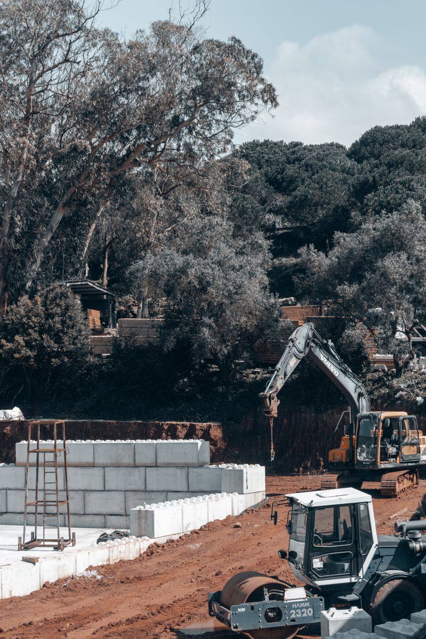 Septic service equipment and open ground on a work site